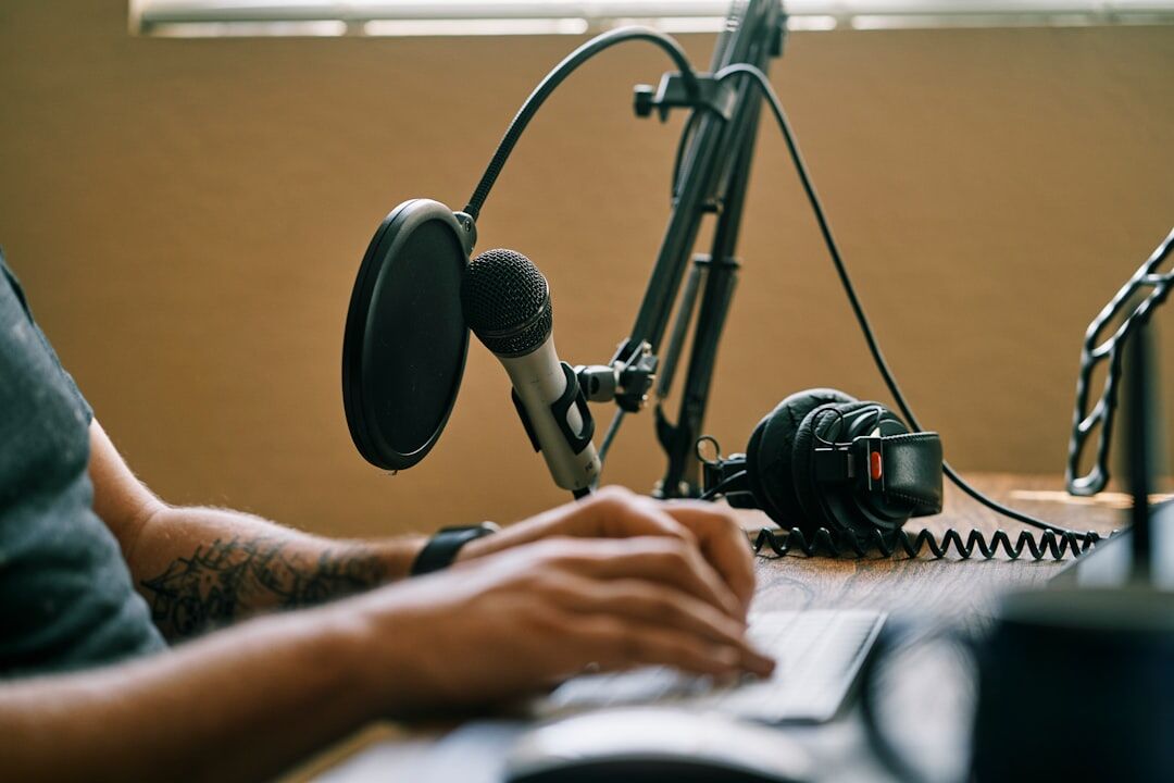 podcast host speaking into microphone