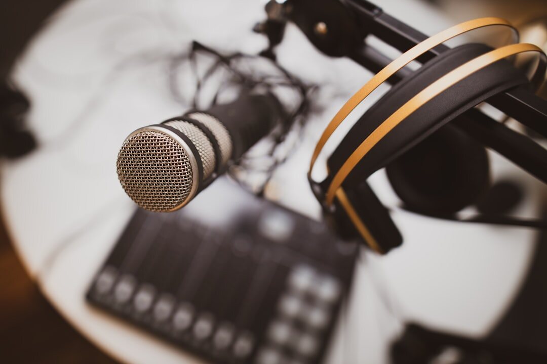 podcast host speaking into microphone