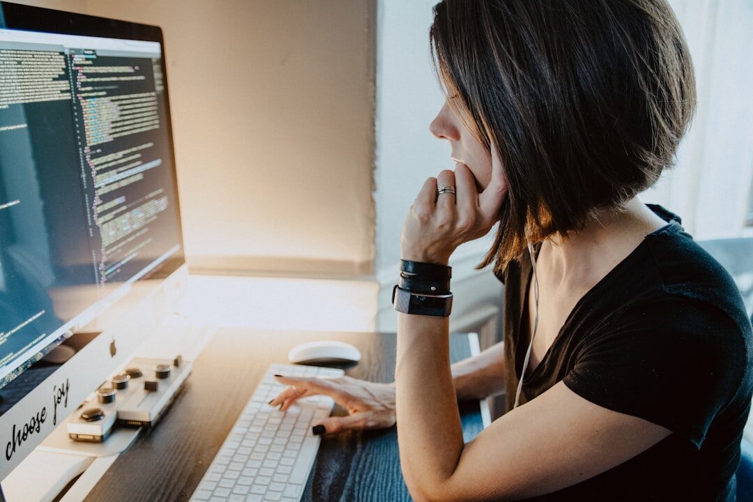 woman editing document on computer